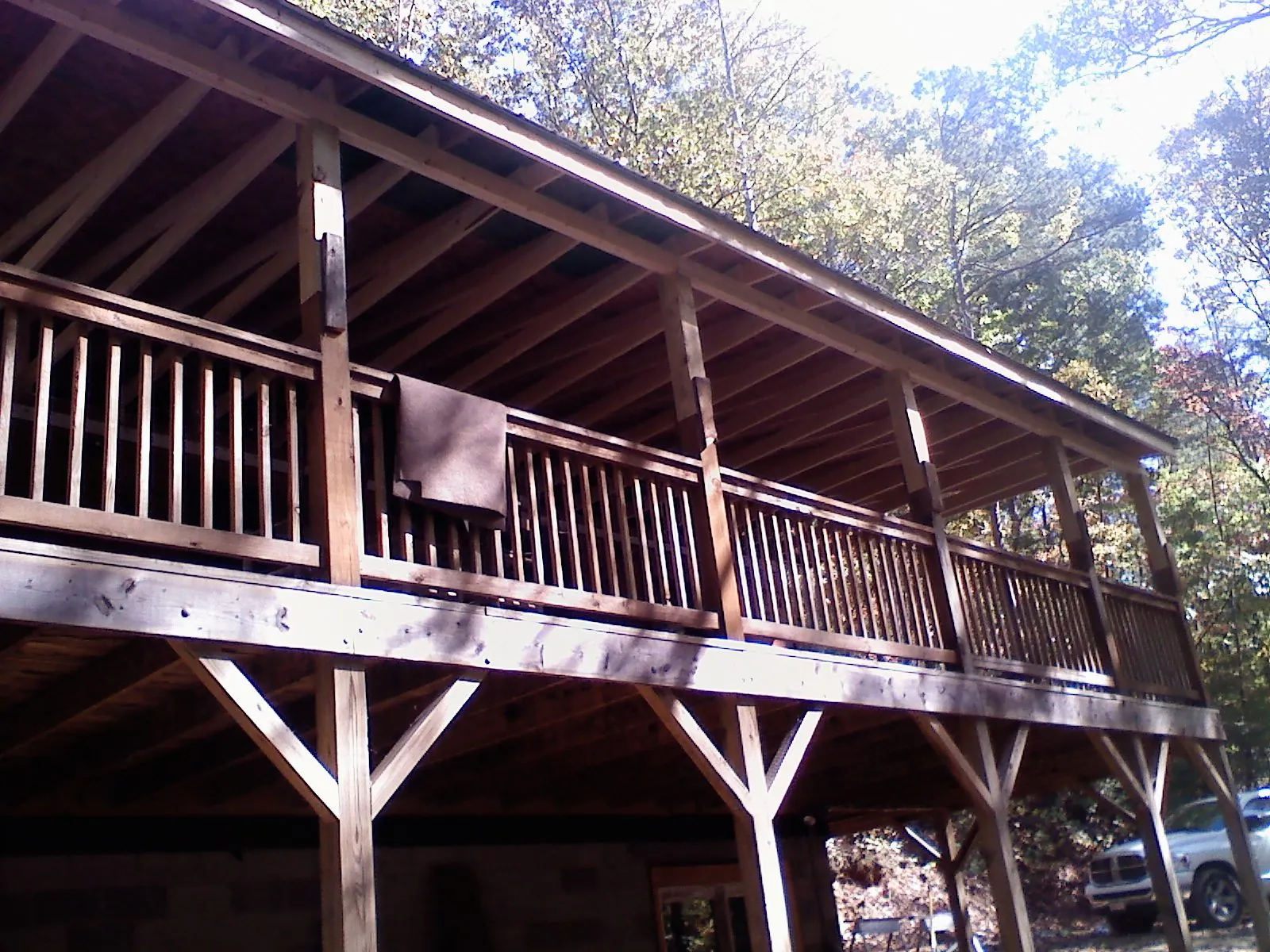 Timber framing under a new elevated porch and deck — Roof Leak Repair in Deweyville by Roofing Brothers